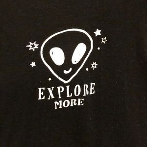 A small black tee with a alien on it!!!!!!!!!!!!!!